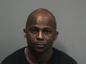 MARK STOKES, AGE 51, OF ROXBURY was arrested late Friday and charged with two counts of armed robbery. (Randolph Police Department Booking Photo)